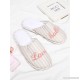 
        Letter Embroidery Striped Flat Slippers
    