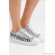 Logo-print glittered leather sneakers
